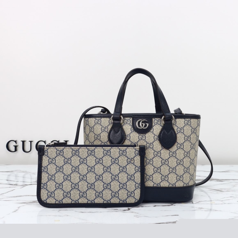 G*u*i shopping bags